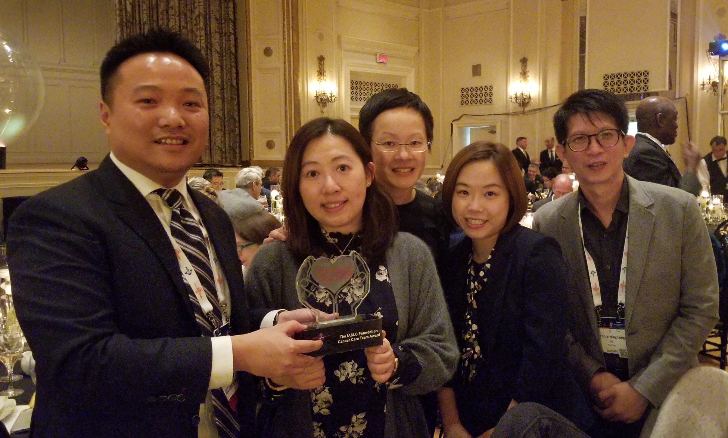 Dr. Herbert LOONG (1st from left) and some members of the award-winning team received the IASLC Foundation Cancer Care Team Award at the IASLC 19th World Conference on Lung Cancer in Toronto in September 2018.