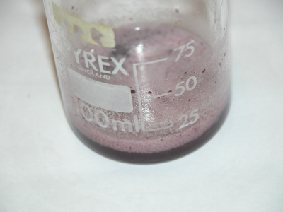 close-up image: 0.3M FeCl3 solution added to the NaOCl/NaOH solution Purple FeO42- formed in the mixture