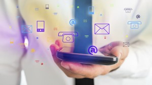 Close up Businessman in White Shirt with Black Tie Holding a Mobile Phone for Modern Contact Concept.