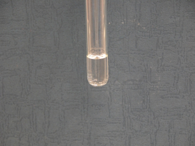 image: The dichloromethane solution containing aspirin and caffeine