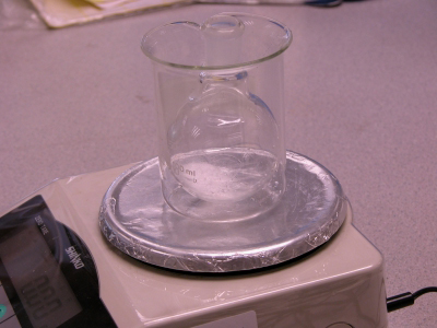 image: Sodium tungstate(VI) dihydrate added into the round-bottomed flask