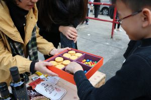 A child takes part in the food testing activity.