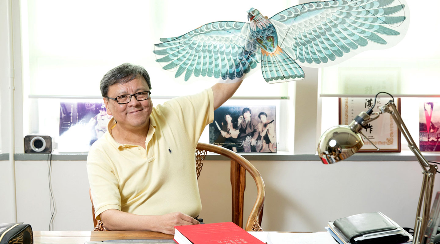 Stephen Shin with the kite that symbolizes hope in <em>The Last Race</em> <em>(Photo by Keith Hiro)</em>