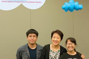 Dr. Ella Chan and two student emcees, Jackel and Singa