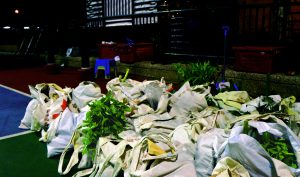 Food waiting to be donated in the basketball court in Tin Yiu Estate.