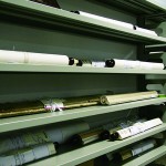 Scrolls of old maps and historical documents