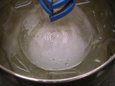 image: Cooling the reaction mixture in an ice-water bath.