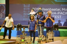 The competition is a relay race of automatic (left) and manual (right) robots. It challenges not only the stability and speed of the robots, but also powers of discretion of the members.