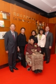 Dr & Mrs Lee Quo Wei posed in the Lee Quo Wei Law Library with their family members.