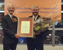 Dr. Colin Storey (right) receives the award from Mr. Peter Sidorko, President of HKLA.