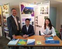 Professor Lin (left) and ISEIS Interns at the UN present CUHK satellite programmes in the Conference.