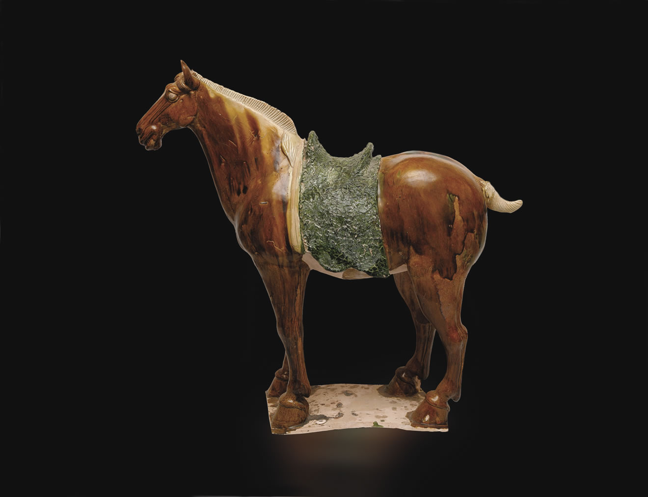 Saddled horse with three-colour glaze
Tang, First half, 8th century
Muwentang Loan