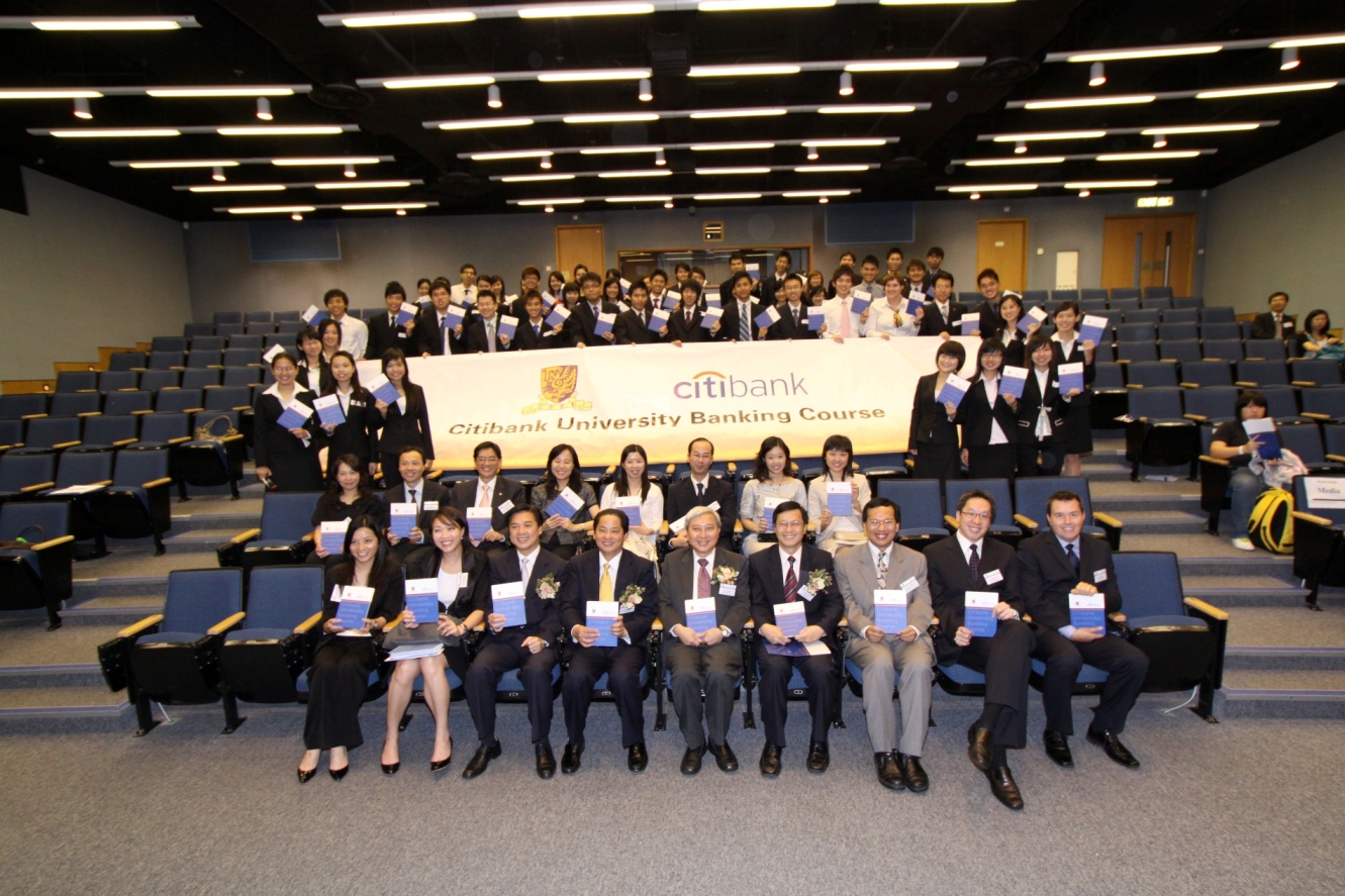 Students of this year's banking course pose a group photo with guests