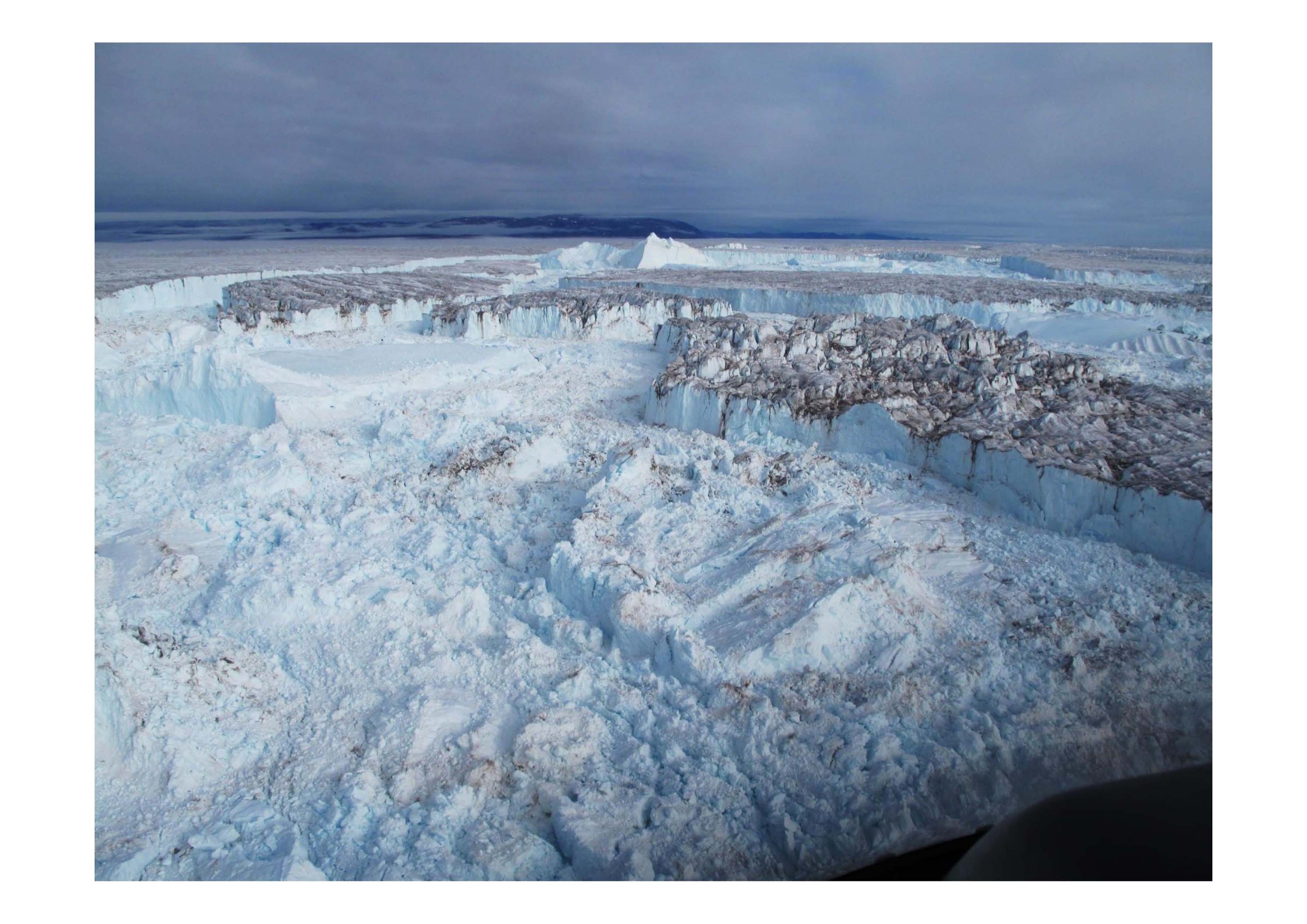 Major outlet glaciers in northeast Greenland disintegration into the ocean.  (Credit:  Finn Bo Madsen.  Khan et al., Nature climate change, 2014 DOI: 10.1038/NCLIMATE2161)