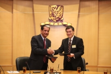 Prof. T.J. Wong, Dean, CUHK Faculty of Business Administration (right) and Prof. Ali Altarrah, Executive Committee Member of Kuwait-Asia University exchange the signed MOU, signifying the launch of this ground-breaking partnership.