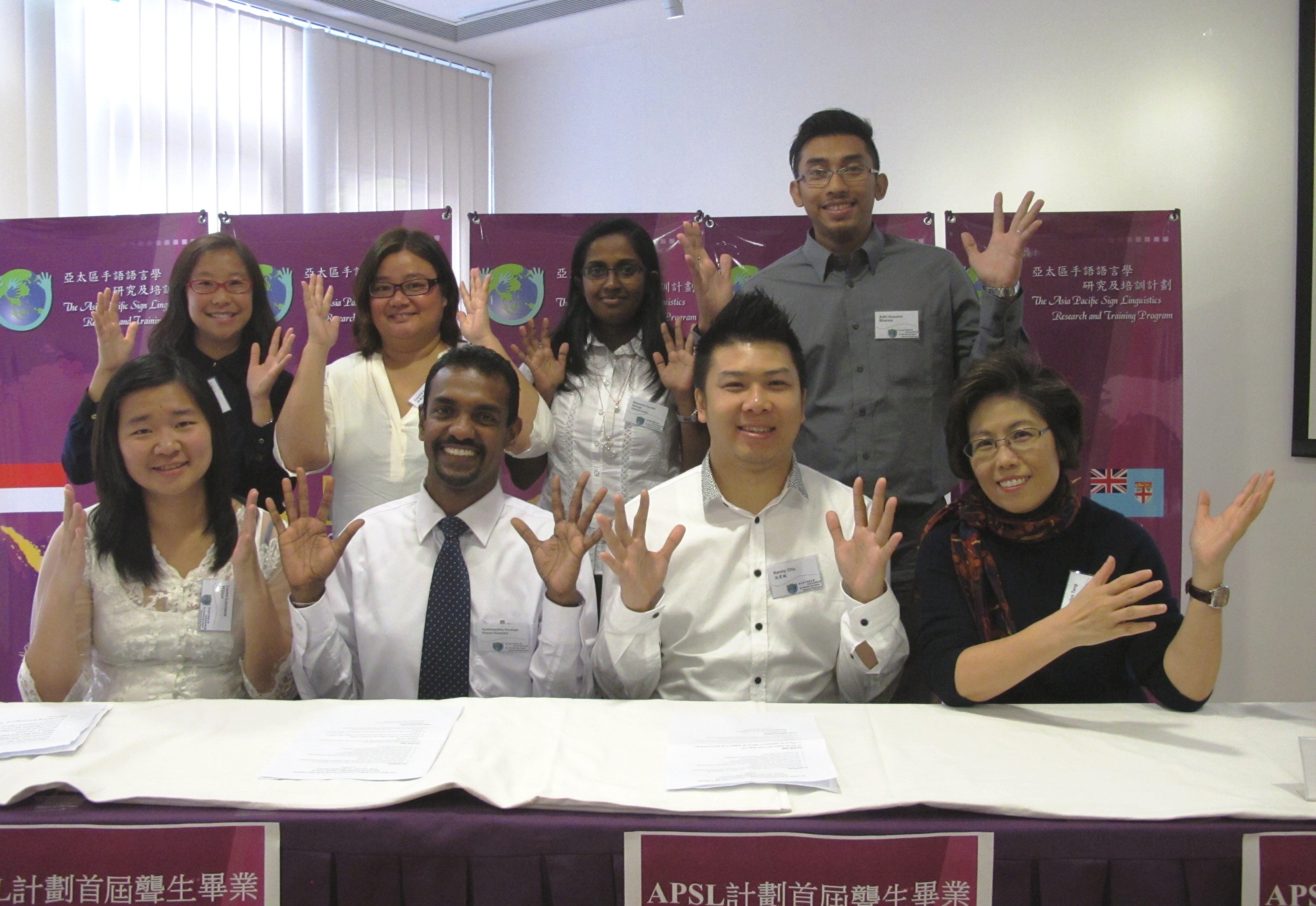 Prof. Gladys Tang, Director of APSL Program (1st right, front row) and the first batch of graduates of Higher Diploma in Sign Linguistics and Sign Langrage Teaching, including Mr. Kenny Chu, Mr. Kodithuwakku Koralege Brayan Susantha, Ms. Laura Lesmana Wijaya (2nd to 4th right, front row), Mr. Adhi Kusumo Bharoto, Ms. Mataramba Kanatta Geshani Amila, Ms. Connie Lo,  and Ms. Lisa Lo (back row from right).