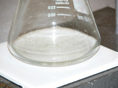 image: Excess HCl is being back-titrated with NaOH solution