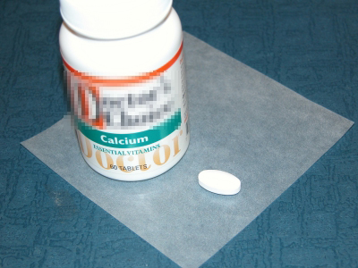 image:Calcium supplement tablets and a bottle of it