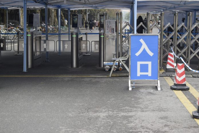 2) The gate of the university campus was closed and machines are placed to indentify everyone that enter and leave campus