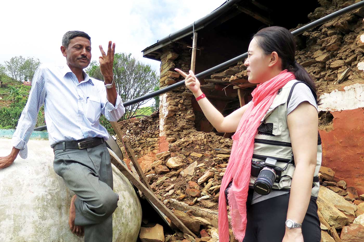 Emily Chan assessing the quake’s aftermath in Nepal in June 2015. Topalo, teacher and
head of Pipalthok Village, tells of his determination to equip local children with better knowledge
of disaster preparedness