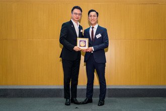 Souvenir presentation by Professor Francis CHAN to Dr James CHOW