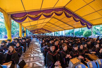 Guests celebrating the happy moment with the graduates