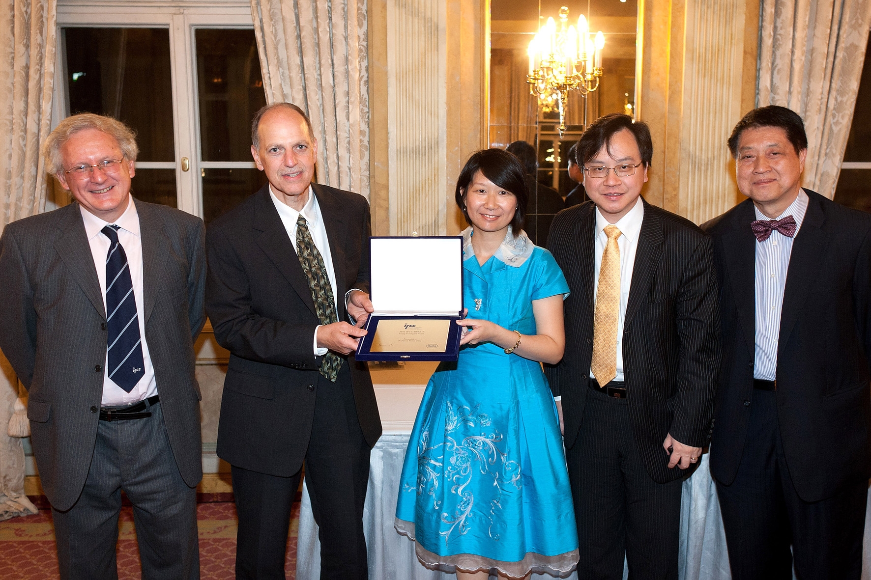 From left: Mr. Graham Beastall, IFCC President; Mr. Joseph Pasarelli, Roche Diagnostics (sponsor for the award); Prof. Rossa Chiu; Prof. Dennis Lo; Prof. Christopher Lam (former chairman of Chemical Pathology, CUHK)