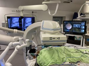 The novel robotic-assisted bronchoscopy uses real-time optical imaging and electromagnetic positioning to enable the operator to navigate the complex human airways.