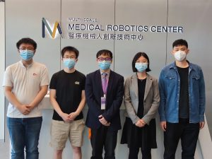 The research team led by Professor Li Zhang (middle) in collaboration with Professor Qi Dou (second on the right). Other team members include: Mr. Jialin Jiang (first on the left), Dr. Lidong Yang (second on the left) and Dr. Xiaojie Gao (first on the right).