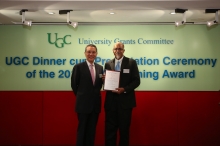 Mr. Edward Cheng, UGC Chairman presents the award to Professor Kumta