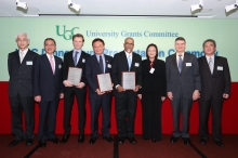 Mr. Cheng and members of the award's selection panel take a photo with the award recipients.