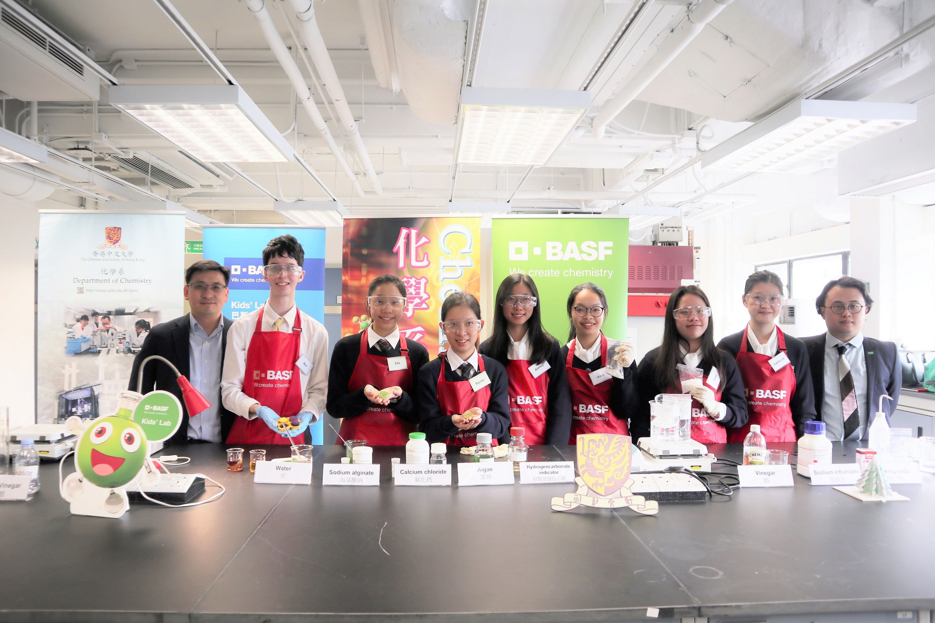 A group photo of the three winning teams along with Prof To Ngai (left), Department of Chemistry, CUHK and Jeremy Tam (right), Manager, Corporate Communications Asia Pacific, BASF.