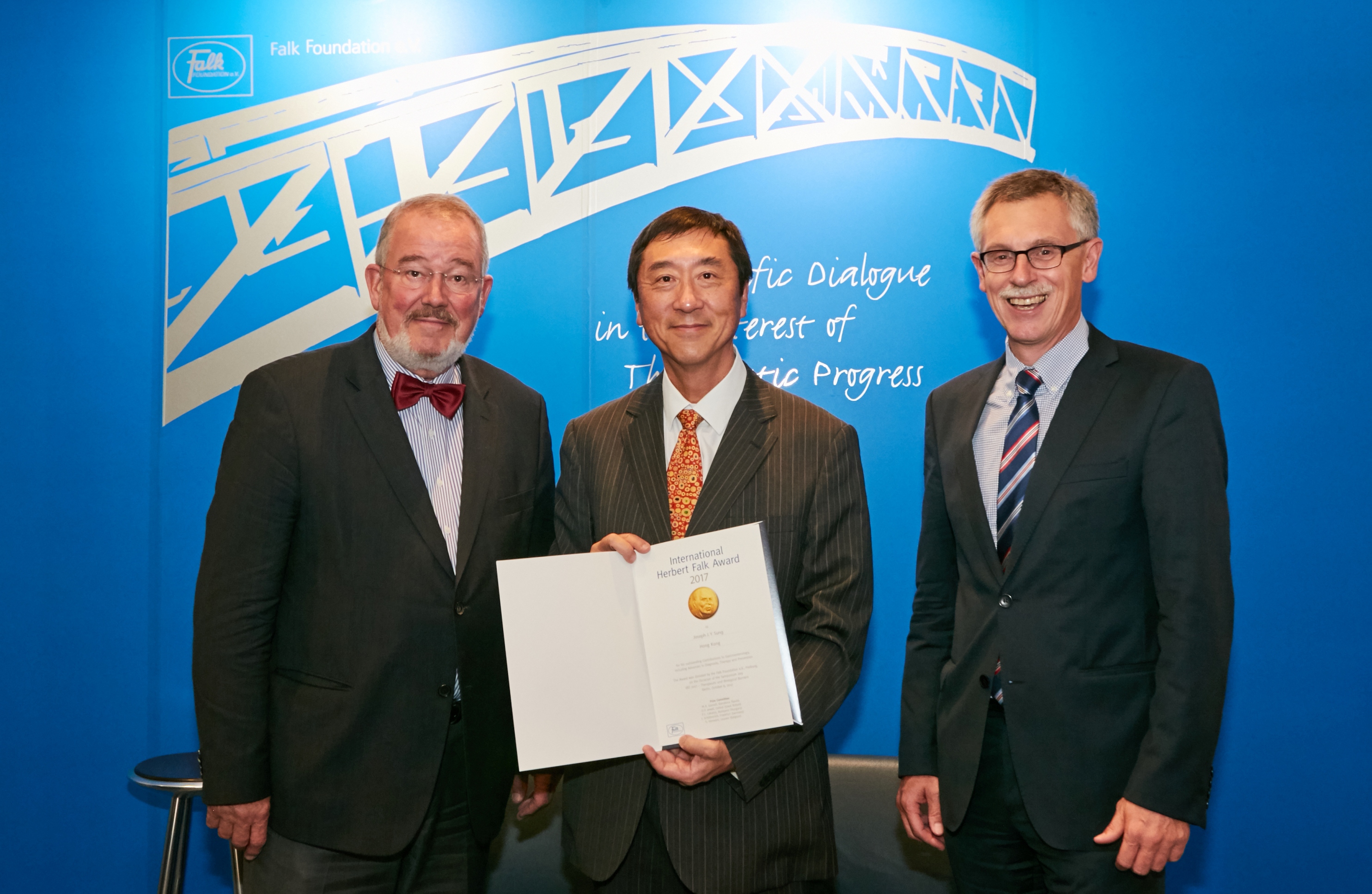 (From left) Prof. Jürgen Schölmerich, co-ordinator of the prize-giving committee, Prof. Joseph Sung and Dr. Roland Greinwald from the Falk Foundation