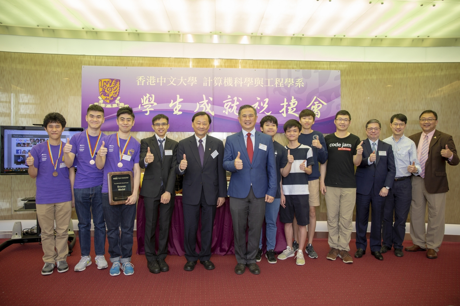 A group photo of members of the CUHK Programming Team and the guests.