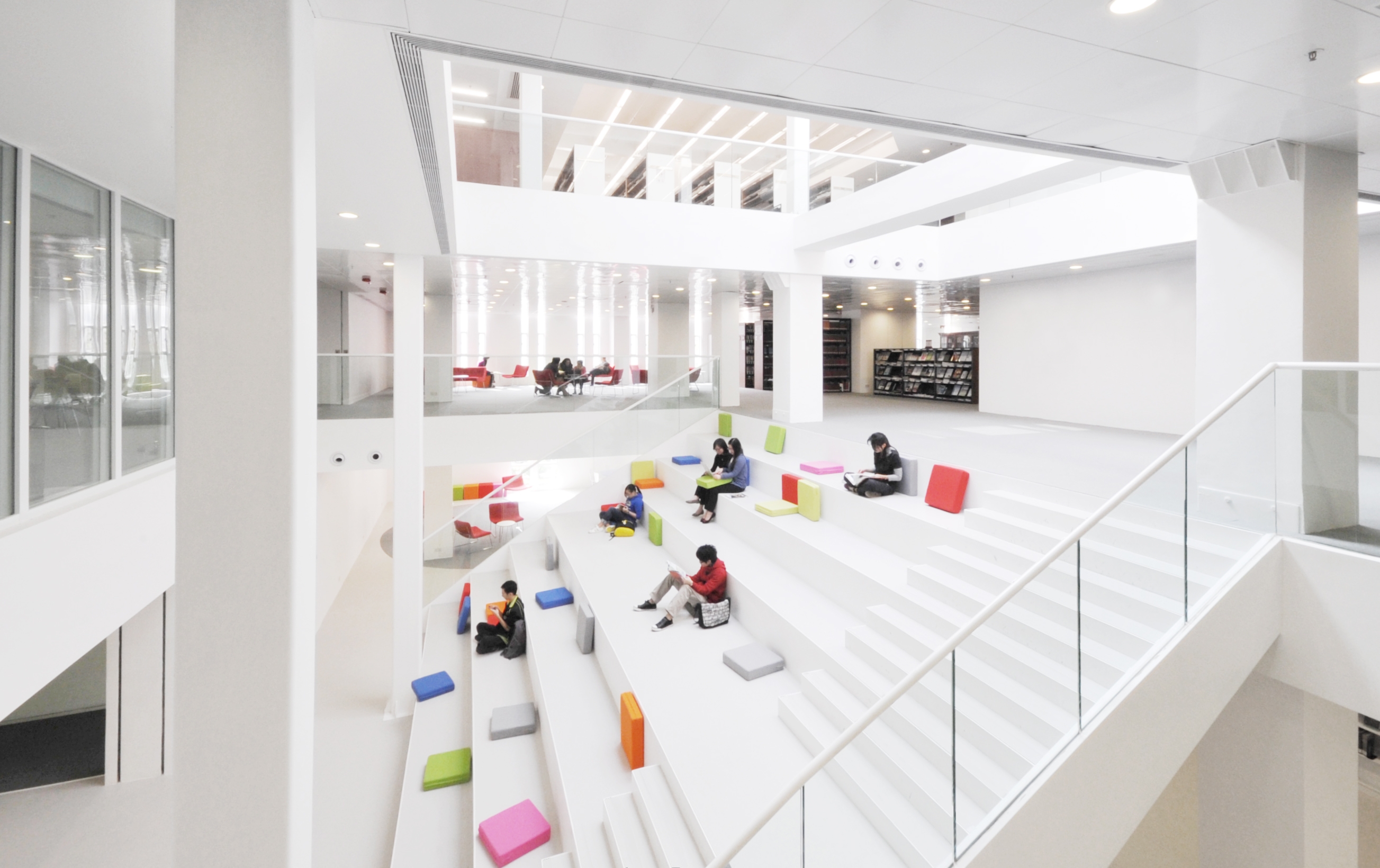 The central grand staircase becomes a reading court that connects different floors (Photo courtesy of Angela Pang)