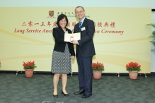 Prof. Fok Tai-fai, Pro-Vice-Chancellor of CUHK presents the certificate of Long Service Award to Prof. Joyce Ma.