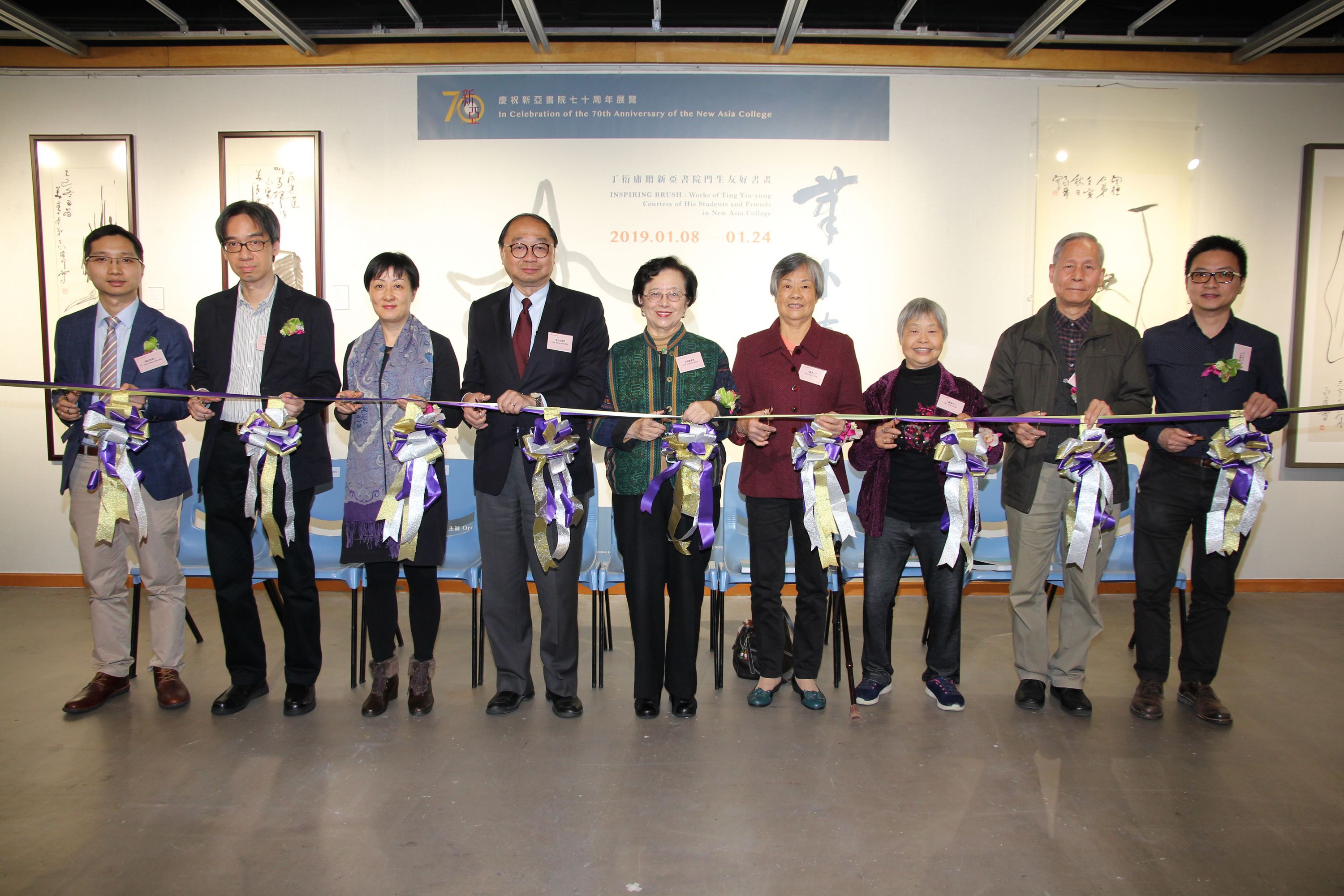 (From left) The ribbon cutting guests include: Dr. Phil Chan, Painting and Calligraphy Research-Assistant Curator of the Art Museum, CUHK; Prof. Harold Mok, Chair of the New Asia College 70th Anniversary Sub-committee on Exhibitions and Souvenirs, and Professor of the Department of Fine Arts; Prof. Xu Xiaodong, Associate Director of the Art Museum, CUHK; Prof. Henry Wong, Head of New Asia College, CUHK; Prof. Mayching Kao, Honorary Fellow of CUHK, Honorary Fellow of New Asia College and Former Director of Art Museum, CUHK; Ting Lan-sai;  Ting Lai-ka; Prof. Lee Yun-woon, former Chair of the Department of Fine Arts, CUHK and Mr. Lo Kwan-chi, Associate Chairman of The Alumni Association of the Fine Arts Department, CUHK.