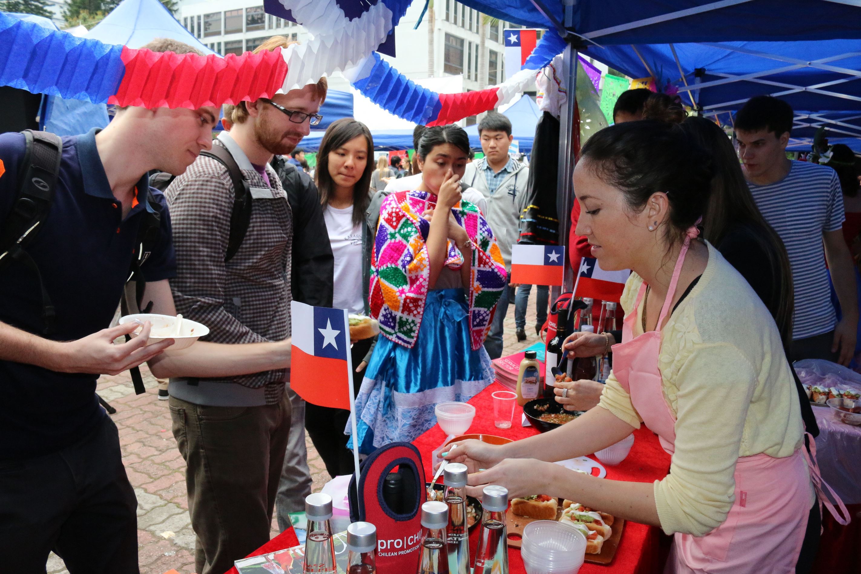 Students from Latin American countries making signature snacks from their homeland.