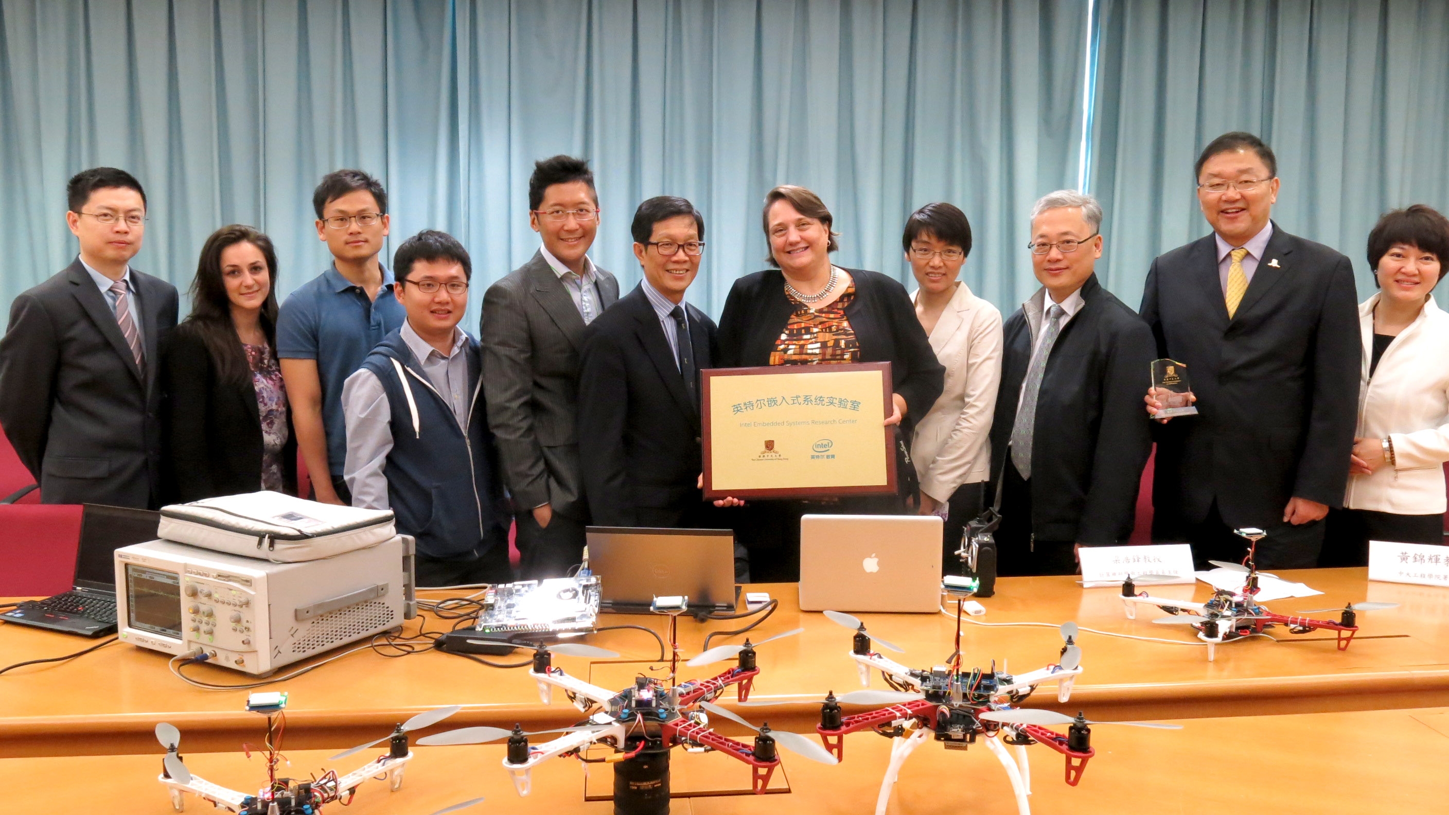 A group photo of the delegation of Intel Corporation and CUHK members.