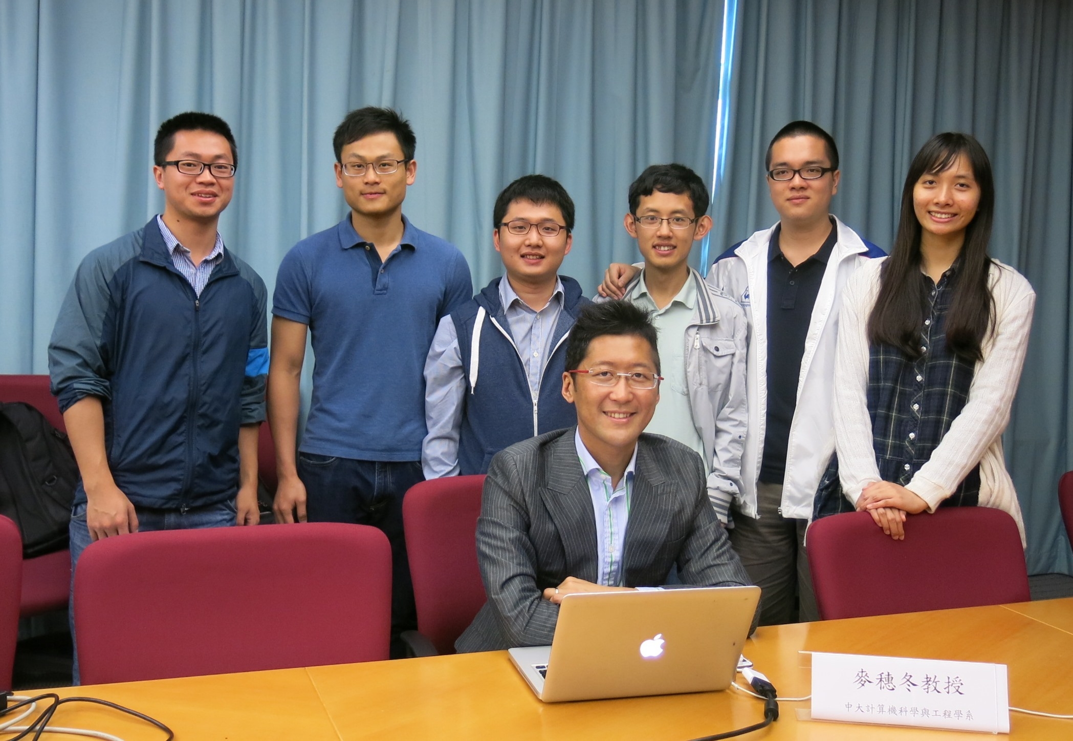 Prof Terrence MAK Sui Tung, Assistant Professor, Department of Computer Science and Engineering, CUHK (front) and his students introduce the embedded systems and related research projects.