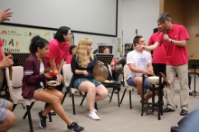 Musicians of HK Chinese Orchestra teach students to play Chinese musical instruments.