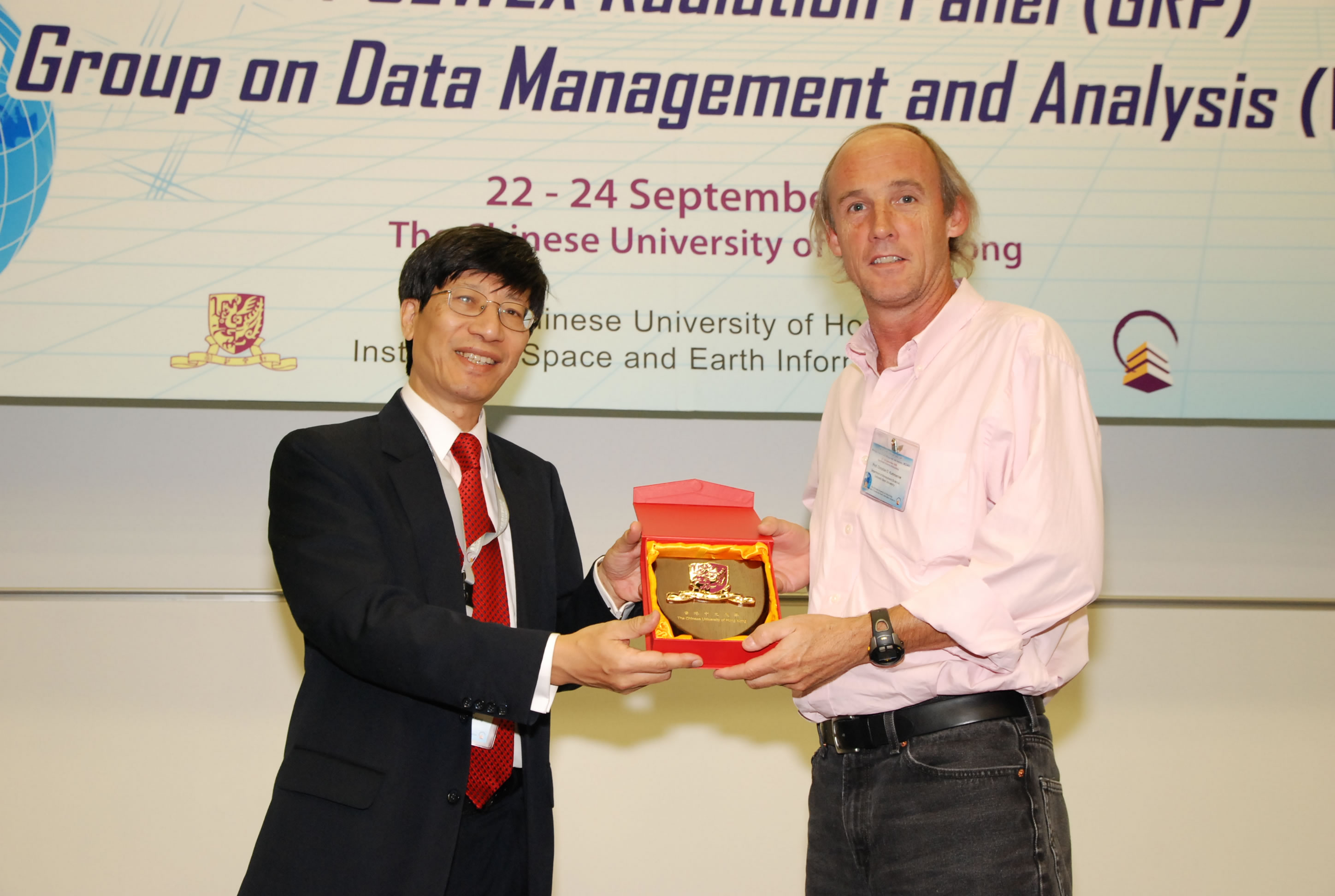 Professor Kenneth Young presents a souvenir to Professor Christian D. Kummerow, GRP Working Group on Data Management and Analysis