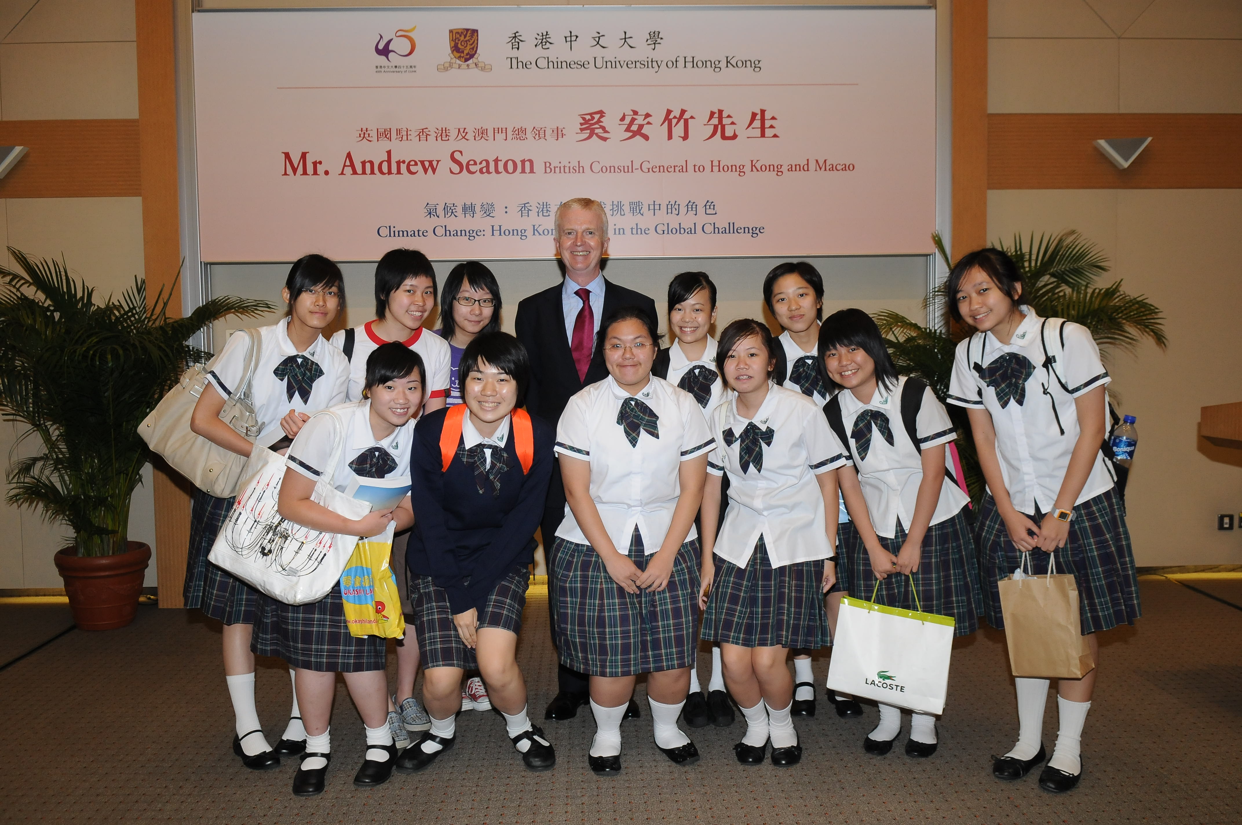 Mr. Andrew Seaton pictures with secondary school students