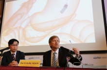 Prof. Dr. Bradley NELSON (right), Director of the Multi-Scale Robotics Lab, Institute of Robotics and Intelligent Systems, ETH Zurich displays animation of an innovative magnetic guided endoscope for small intestine check-up