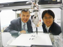 The Robotic Expression of Acquired Penmanship (REAP) is a robot that attempts to learn Chinese calligraphy and painting by imitation. It is developed by Professor Yam Yeung (left), Chairman of the Department of Mechanical and Automation Engineering, CUHK, and Josh Lam, his PhD student