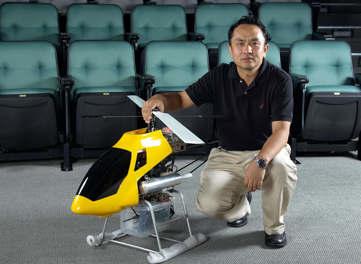 Prof. Liu Yun-hui with the small autonomous helicopter he invented