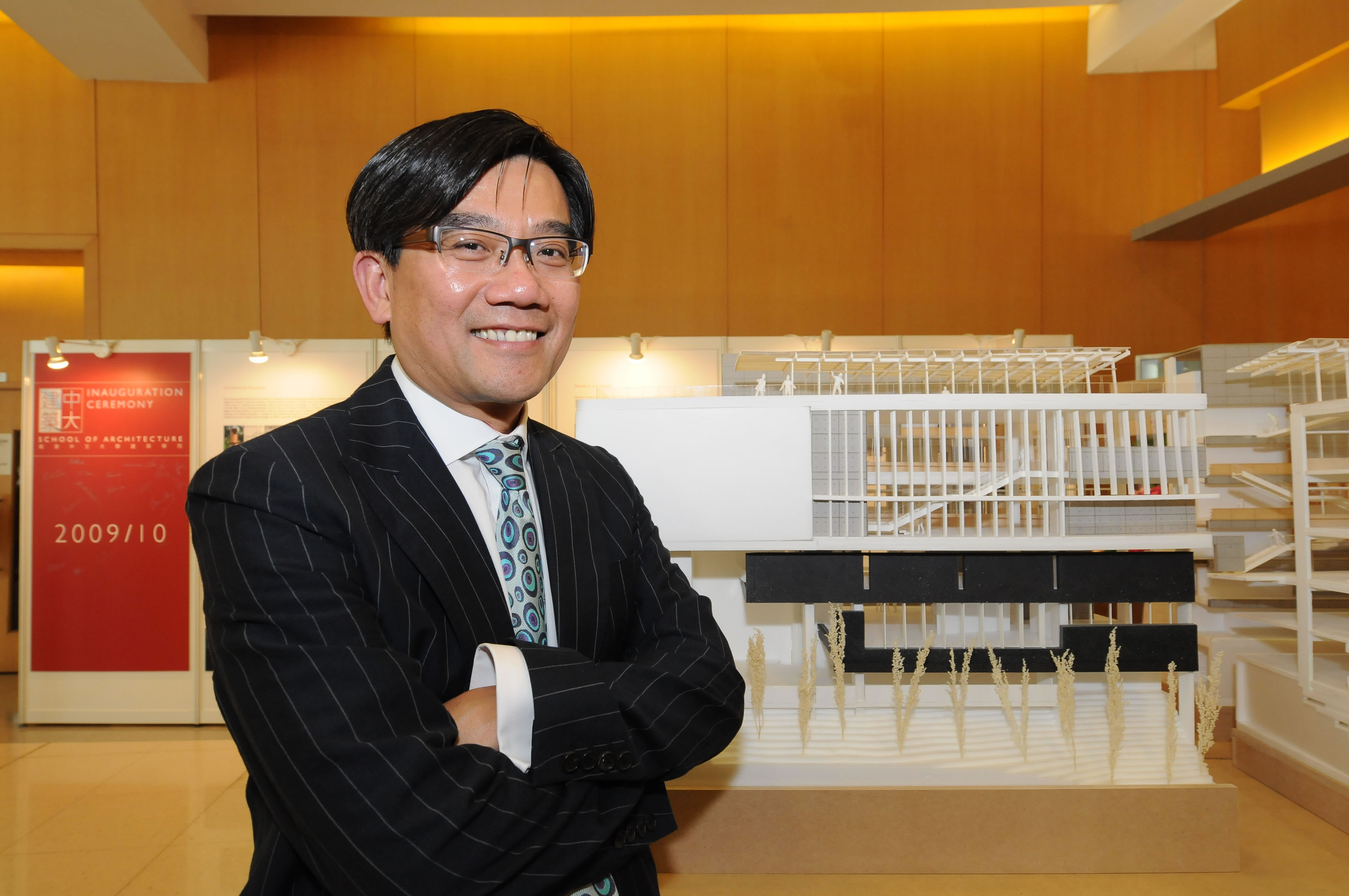 Prof. Puay-peng Ho, Founding Director of the School of Architecture, CUHK, with the model of a new teaching block