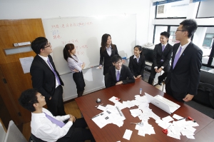 Members of the GPA debating team discuss about the motion