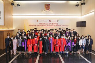 Group photo of procession members and secondary school principals and teachers