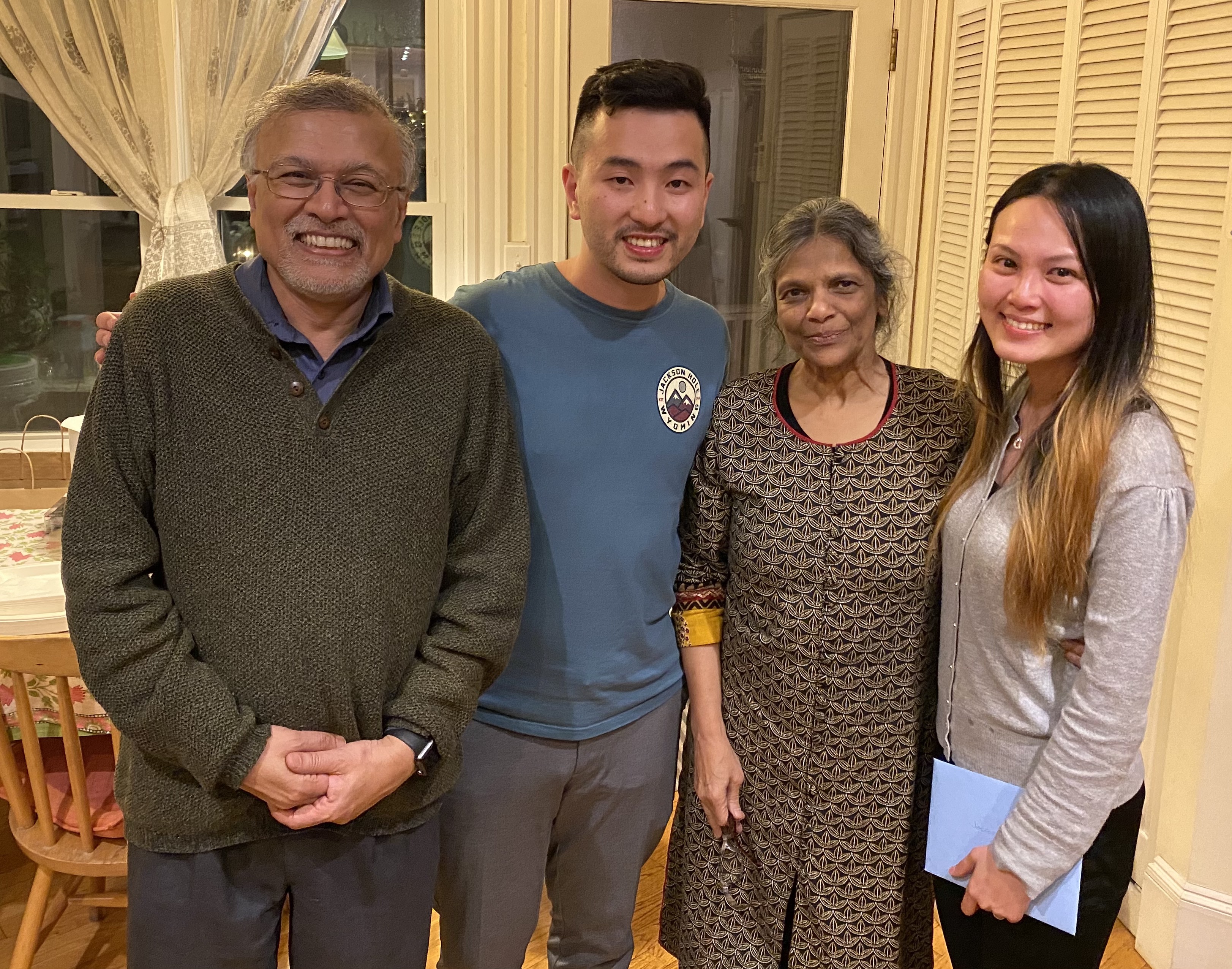 Prof. Ip at farewell party for his post-doctoral supervisor, Prof. Mriganka Sur and Mrs. Sur, and with his wife Hayley (right).